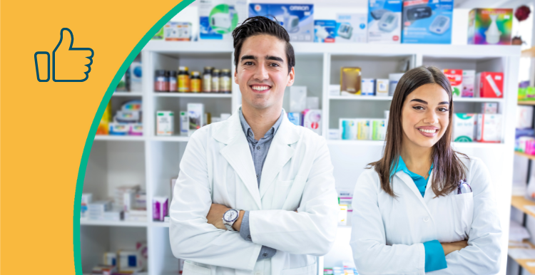 two pharmacists that are happy, thumbs up