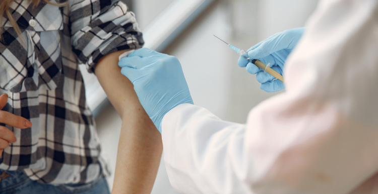 woman receiving vaccination