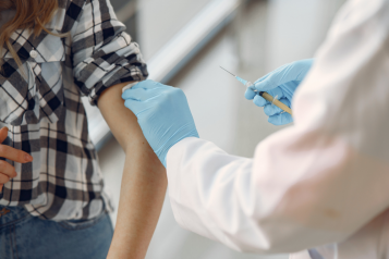 woman receiving vaccination