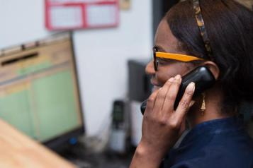 woman answering the phone