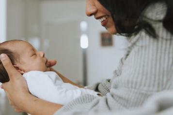 woman holding baby