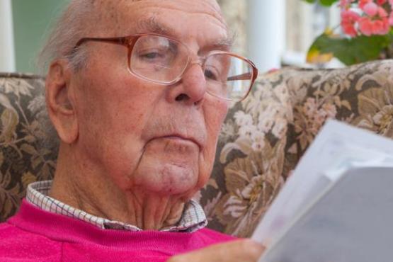 man reading newspaper